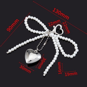 Silver pearl bow keychain with large heart pendant for bags and phone cases diy accessory
