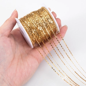 DIY 1.5mm gold plated stainless steel thin tile chain on a white plastic spool