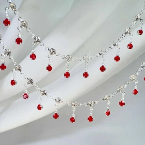 Silver fringe chain with sparkling white rhinestones and vibrant red gemstone pendants