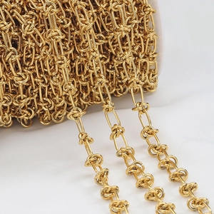 Macro shot of gold-plated stainless steel chain rolls for DIY jewelry making