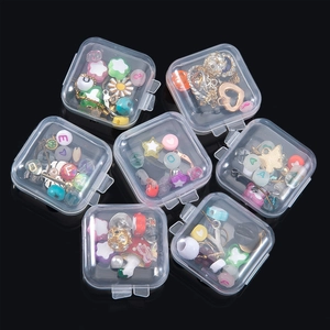Set of 7 clear PP plastic storage boxes containing assorted colorful DIY jewelry beads