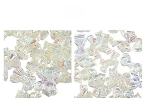 Detail of aurora resin bow nail charms with 3D translucent iridescent finish effects