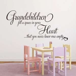 Grandchildren quote wall decal on a playroom wall with heart patterns in matte vinyl