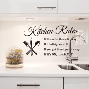 Minimalist black Kitchen Rules wall sticker with utensil icons on white kitchen background