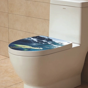 Detailed view of ocean turtle and sea landscape waterproof stickers on white toilet lid