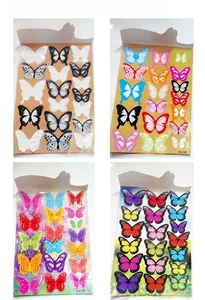 Macro layout of 3D butterfly wall stickers in four color schemes with 21x29.5cm dimensions