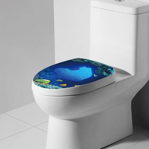 Detail of 3D ocean sea fish and coral reef print on a white bathroom toilet lid cover