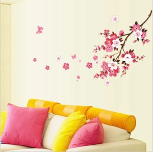 Pink plum blossom branch wall decal with falling petals and butterfly for living room decor