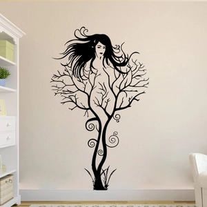 Artistic black wall decal featuring a female silhouette merged with tree branches for decor
