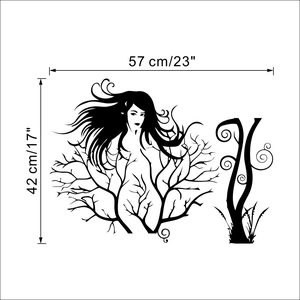 Detail view of artistic female silhouette with tree branches wall decal in black PVC
