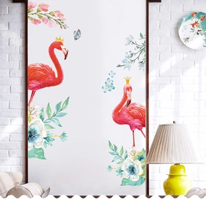 Pink flamingo wall sticker with flowers and butterflies on a white brick background