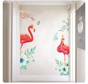 Nordic flamingo and floral wall stickers decorating a hallway wall in a modern home