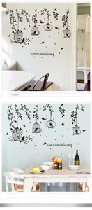 Detail of black birdcage and leaves wall decal with 'Love is a perpetual belief' quote