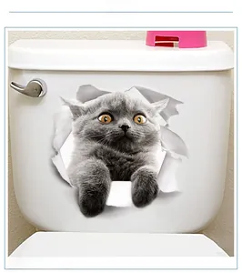 3D realistic gray British Shorthair cat hole wall sticker applied on white toilet tank
