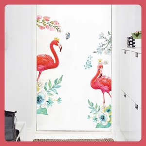 Nordic flamingo wall decal with flowers and butterflies on white interior door