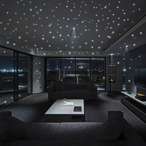Living room ceiling with glowing dots wall stickers creating a starry night effect