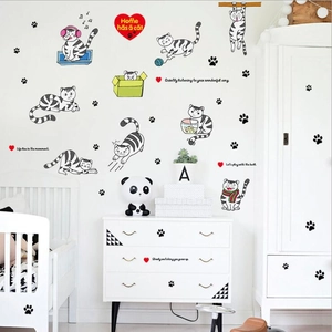 Cartoon kitten wall stickers with black cat paw prints for kids room decor