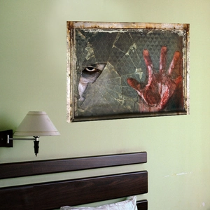 Halloween wall sticker with creepy eye and bloody hand behind broken glass window