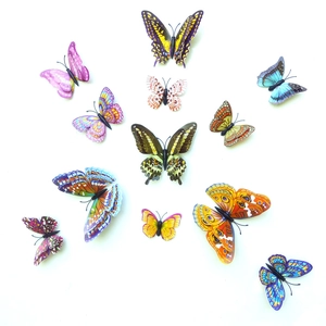Detailed set of 12 multi-colored 3D luminous butterfly wall stickers with PVC textures