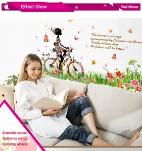 Girl on floral bicycle wall decal with colorful butterflies for living room decor