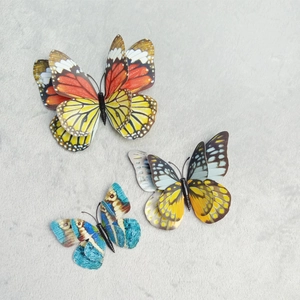 Macro shot of double-layered 3D butterflies with realistic patterns on a soft background