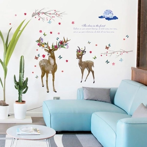 Nature wall decals featuring forest deer, cherry blossoms and inspirational quotes for living room