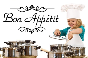Detail view of stainless steel cookware set with glass lids and heat-resistant handles