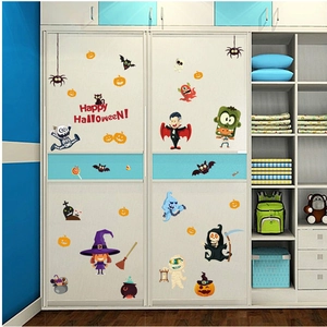 Cartoon Halloween wall stickers featuring pumpkins and ghosts on a white closet door