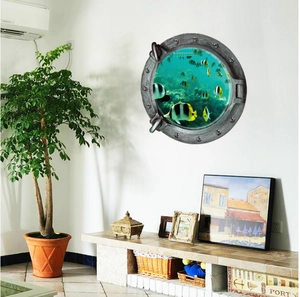 3D porthole wall decal showing underwater ocean world with coral reefs and tropical fish