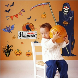 Kid posing with spooky Halloween wall stickers featuring reaper, bats, and pumpkins