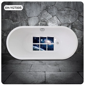 Macro view of galaxy pattern bathtub stickers with starry nebula on white ceramic tub