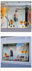 Halloween window stickers featuring pumpkin characters and Happy Halloween text decor