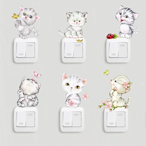 Set of 6 cute cartoon cat wall stickers for light switches in a creative kids' room decor