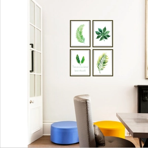 Set of 4 Nordic green tropical plant wall art prints in black frames for modern home decor