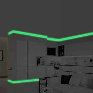 Luminous green glow strip for home decor on ceiling and skirting boards in dark