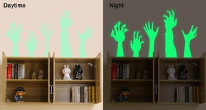 Luminous Halloween zombie hand wall stickers showing daytime and green glow night effect