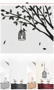 Detail of birdcage and branch wall sticker with cursive romantic quote for home decor