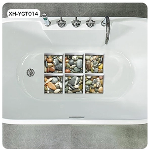 Detail of six 3D pebble pattern waterproof bathtub stickers on a white tub surface