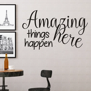 Inspirational 'Amazing things happen here' wall sticker with minimalist decor