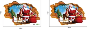 Detail showing two sizes of 3D Santa Claus wall stickers with a broken wall effect