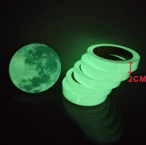 Luminous green 2cm safety tape and moon wall sticker set glowing in the dark