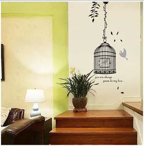 Minimalist black birdcage wall sticker with birds and vines for living room decor
