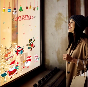 Festive Christmas window stickers with Santa Claus, penguin, and reindeer PVC decals