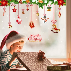 Christmas window decals with Santa, snowman and reindeer for festive wall decoration