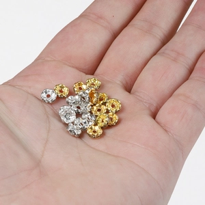 14K gold plated flower-shaped metal spacer beads for DIY jewelry making in gold and silver