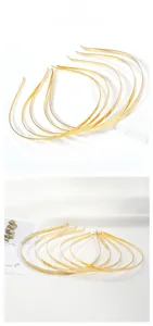 Close-up of slim gold metallic headbands for DIY hair accessories and craft supplies