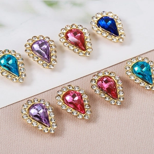 Teardrop glass crystals with gold halo settings in multiple colors for DIY crafts