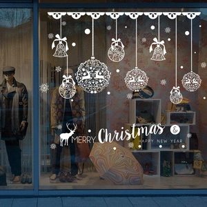 White Christmas window decals with reindeer balls and snowflakes for shop display