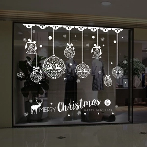 White Christmas window stickers featuring bells, reindeer ornaments and Merry Christmas text