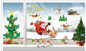 Detail of Christmas wall stickers featuring Santa, reindeer, and snowman in snowy scene